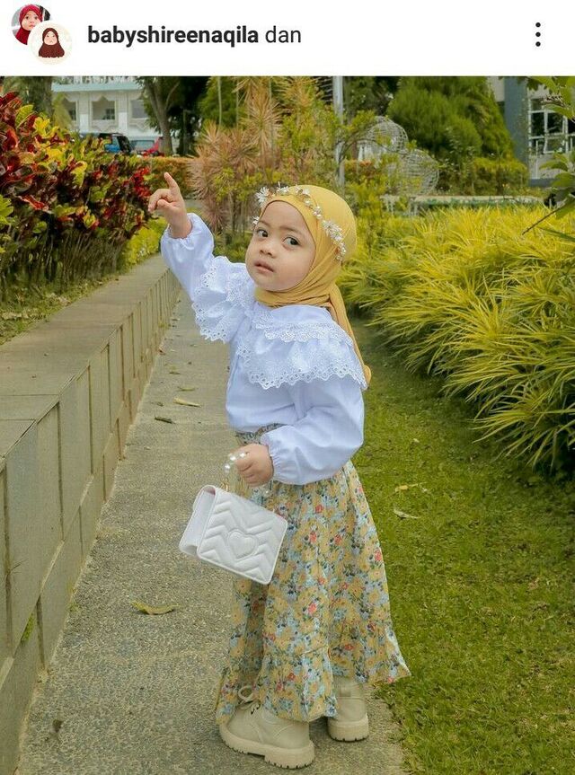 desain pakaian Si kecil